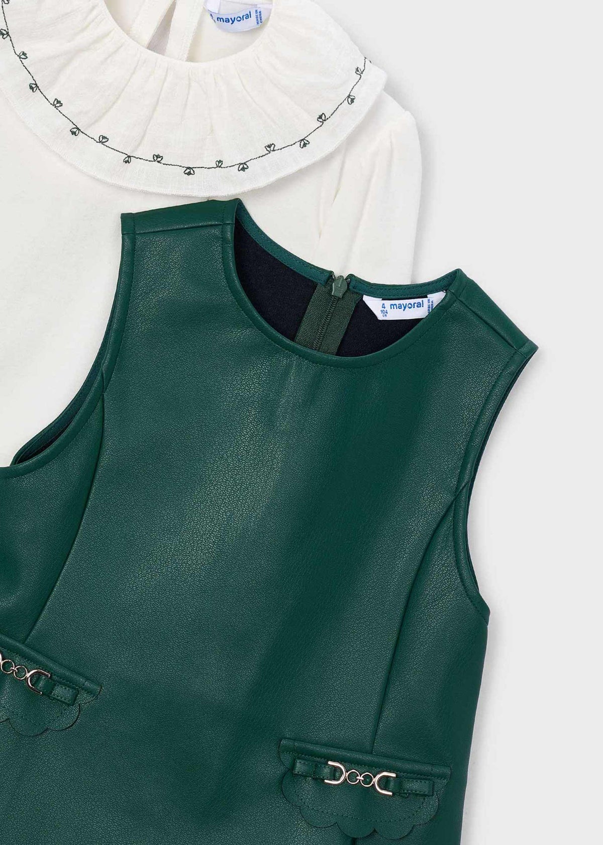 Faux leather dress with a girl's blouse
