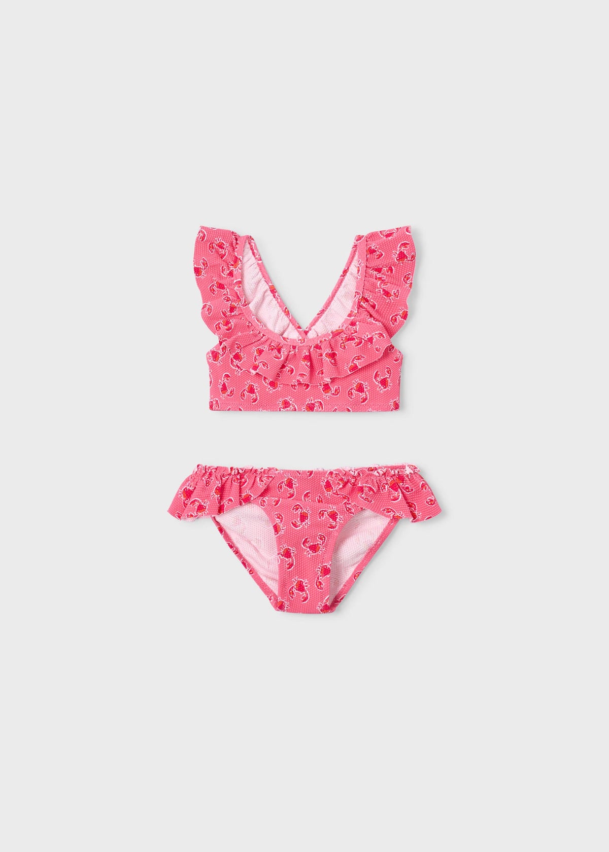 Mädchen im gerüschten Bikini